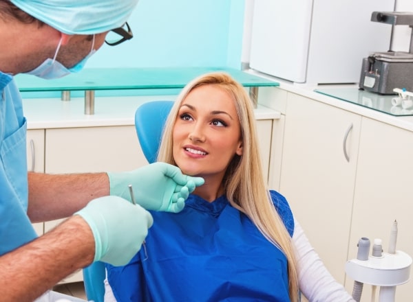 Woman receiving same day dentistry treatment