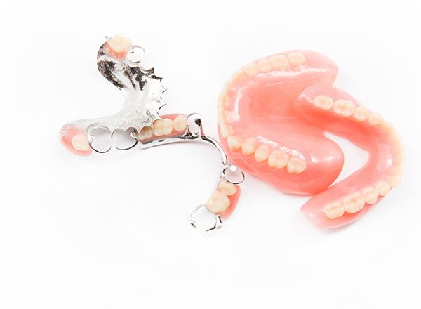 Close-up of partial and full dentures in Phoenix, AZ