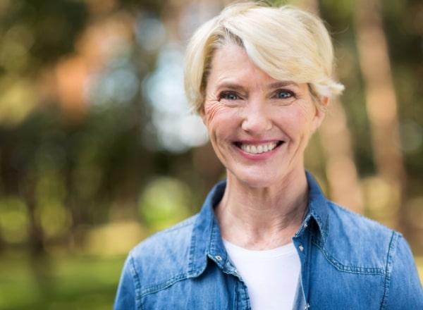 Woman enjoying the benefits of tooth colored fillings