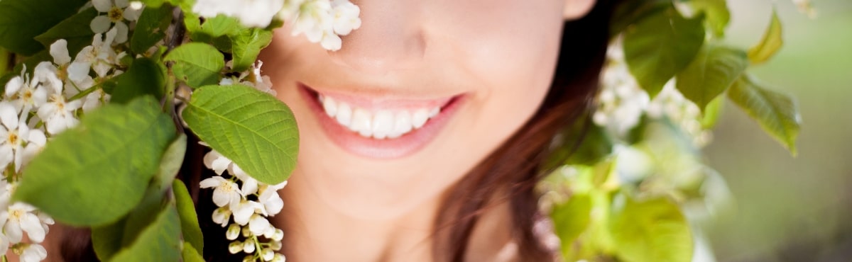 Patient sharing healthy smile after teeth cleanings