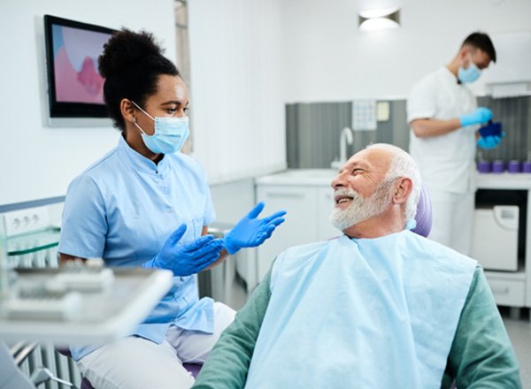 Man smiling in dental chair