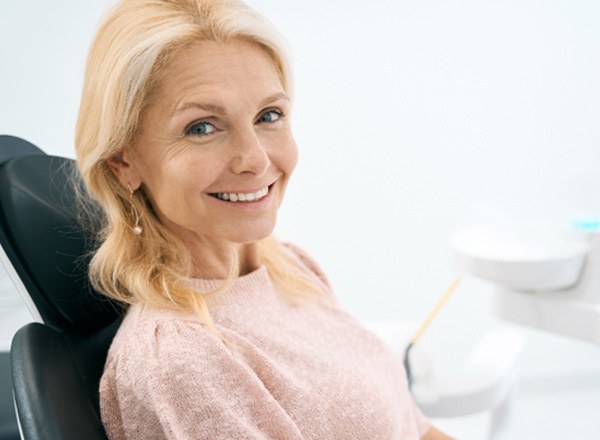 Woman smiling in dental chair