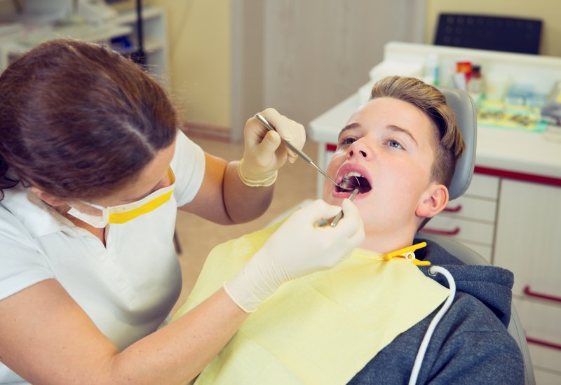 Teen at dentist