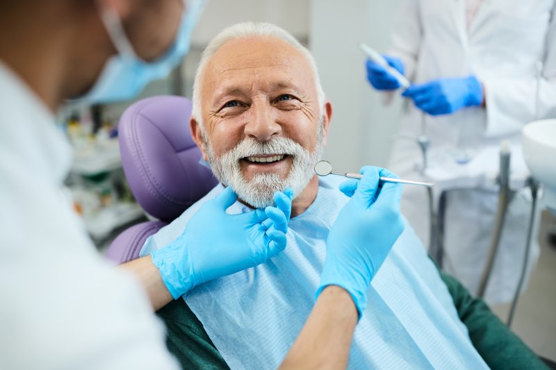 Man smiling in the dental chair